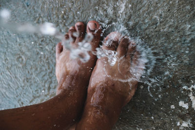 Low section of man in water