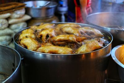 Close-up of meat in cooking pan