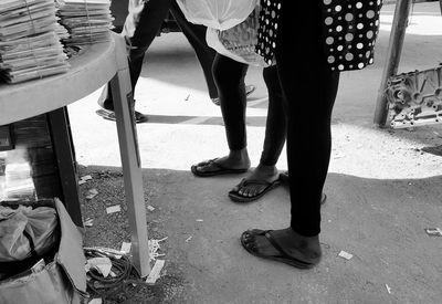 Low section of people at street market stall