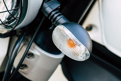 Close-up of motorcycle headlight