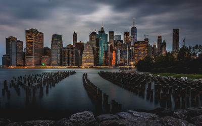 Panoramic view of river and buildings against sky