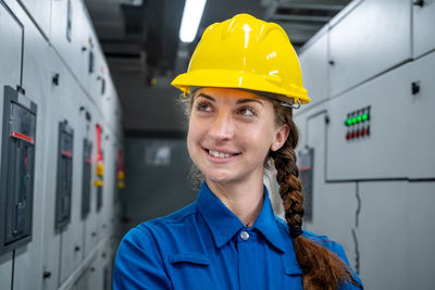 Portrait of smiling woman standing