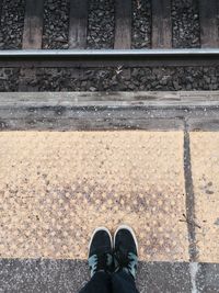 Low section of man on railroad track