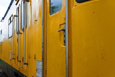 Close-up view of yellow train