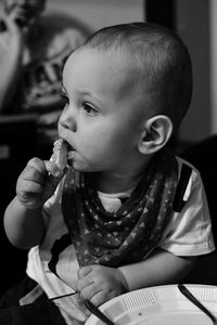 Close-up of cute girl eating food