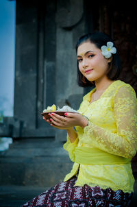 Young woman looking at camera