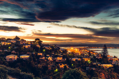 Cityscape against sky during sunset