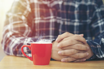 Close-up of coffee cup on table