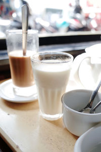 Close-up of coffee cup on table