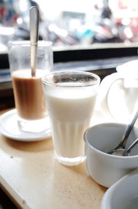 Close-up of cappuccino served on table