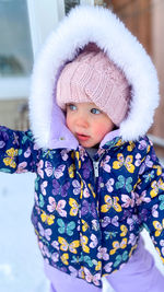 Portrait of cute girl in snow