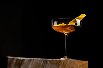 Close-up of wineglass on table