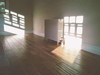 Empty corridor along pillars