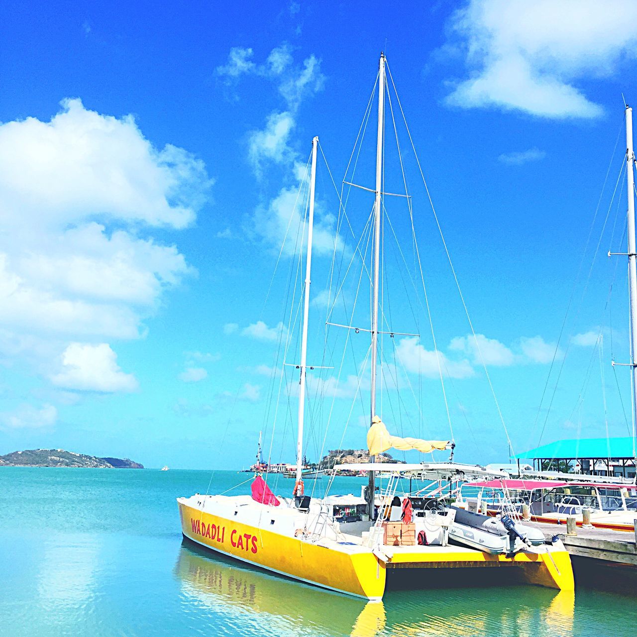 nautical vessel, water, sea, boat, transportation, sky, mode of transport, moored, blue, sailboat, cloud - sky, mast, cloud, waterfront, horizon over water, tranquil scene, nature, scenics, tranquility, cloudy