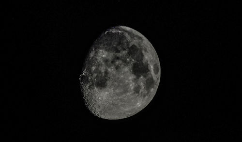 Low angle view of moon against sky at night