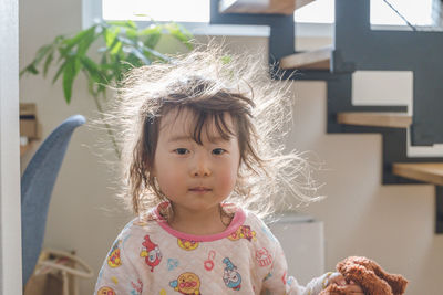 Portrait of cute girl looking away