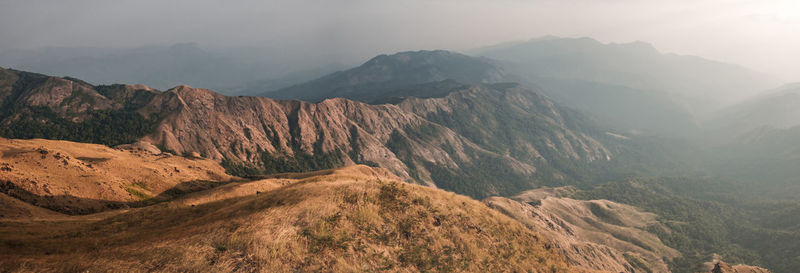 Hands outstretched to receive natural light and mountain views . hipster style. mulayit in myanmar