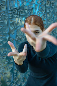 Portrait of woman on a blue background