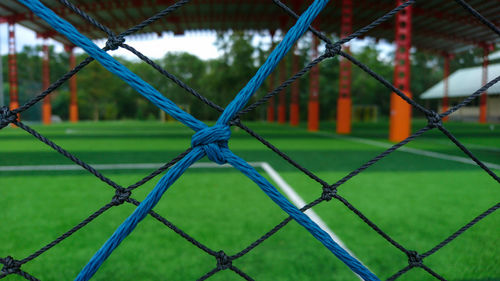 Full frame shot of net on playing field
