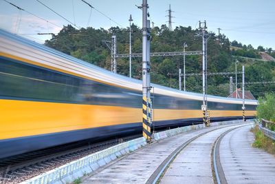 Blurred motion of train on railroad tracks