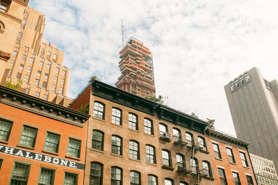 Low angle view of modern building against sky