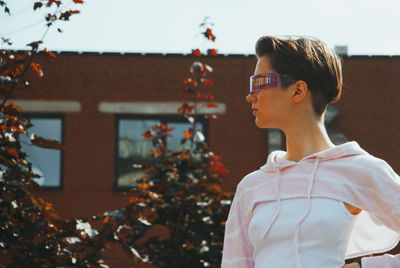 Portrait of young woman on sunglasses