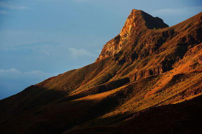 Low angle view of mountains against sky at canary islands