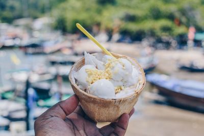 Hand holding ice cream