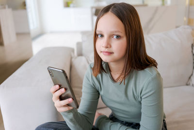 Young woman using mobile phone