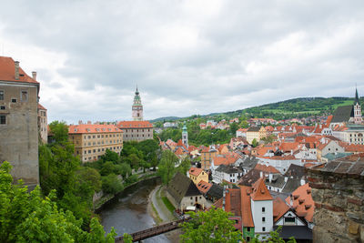 Buildings in town against sky