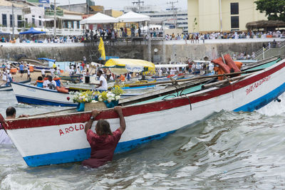 Group of people on boat in sea