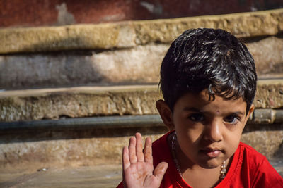 Close-up portrait of boy looking at camera