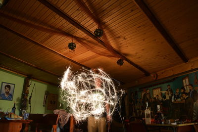 Low angle view of illuminated lights