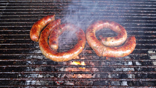 Close-up of fire on barbecue grill