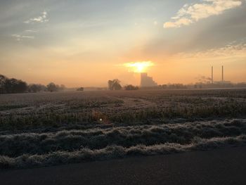 Scenic view of landscape at sunset