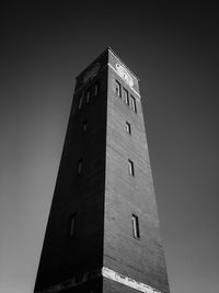 Low angle view of clock tower against sky