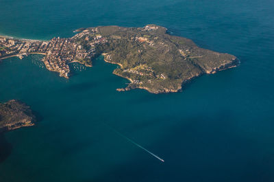 Aerial view of island amidst sea