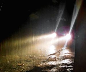 Scenic view of waterfall at night