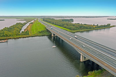 Bridge over river against clear sky