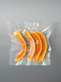 High angle view of orange fruit on table