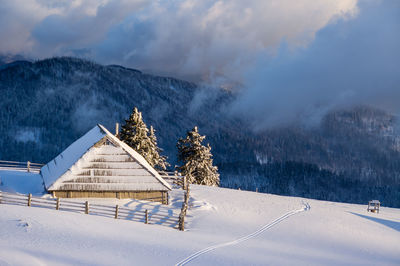 Scenic view of snowcapped mountains against sky