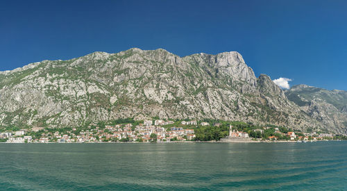 Scenic view of sea against blue sky