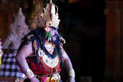 Close-up of man performing traditional dancing