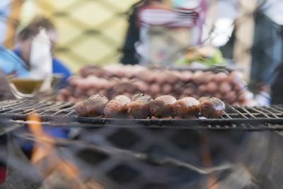 Close-up of meat on barbecue grill