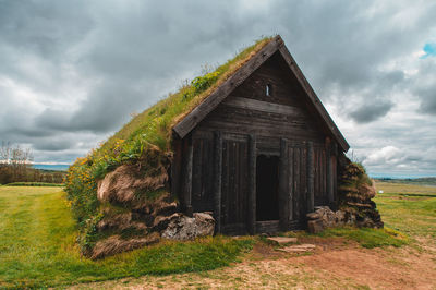 House on field against sky