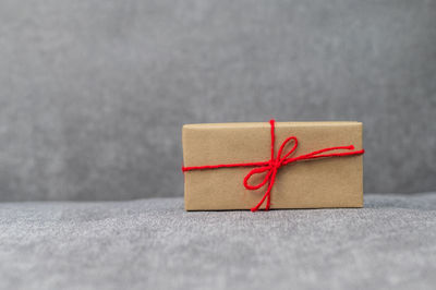 Close-up of red paper in box on table