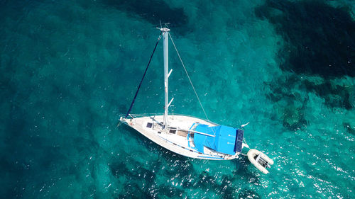 High angle view of sailboat sailing in sea