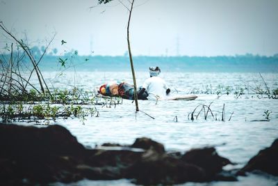 Oldman fishing in lake