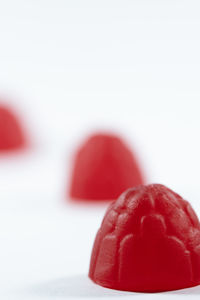 Close-up of strawberry over white background