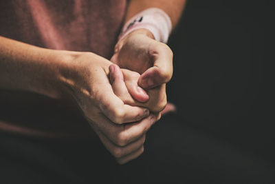 Cropped hand of man holding hands